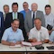 Die Oberbürgermeister und Bürgermeister des Main-Tauber-Kreises sowie Landrat Reinhard Frank unterzeichnen die interkommunale Vereinbarung zur Breitband-Erschließung ihrer Kommune.