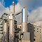Das Biomasseheizkraftwerk erzeugt Strom und Wärme aus naturbelassener Biomasse und Altholz, überwiegend aus der Sperrmüllsammlung im Rhein-Main-Gebiet. 