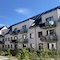 Solaranlagen auf dem Dach erzeugen Strom für ein neues Quartier in Hamburg.