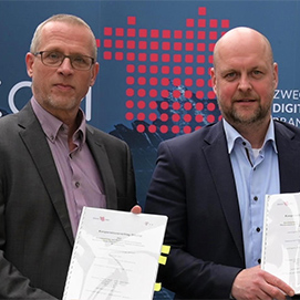 DIKOM und Deutsche Telekom Business Solutions besiegeln ihre Zusammenarbeit.