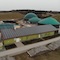 Großbardorfer Heizzentrale und Biogasanlage mit Haselnussplantage und Photovoltaik-Dachanlage.